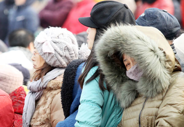 天气转暖莫急脱衣 正确春捂防生病